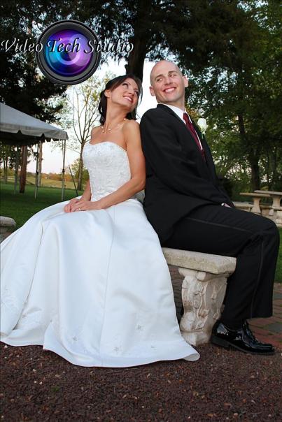 bride groom park bench looking overshoulder